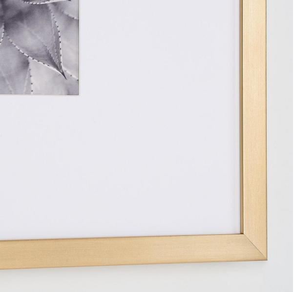 white and gold picture frames