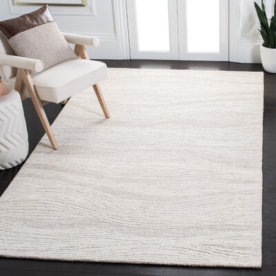 Aldwell Abstract Handmade Tufted Wool Cream Area Rug